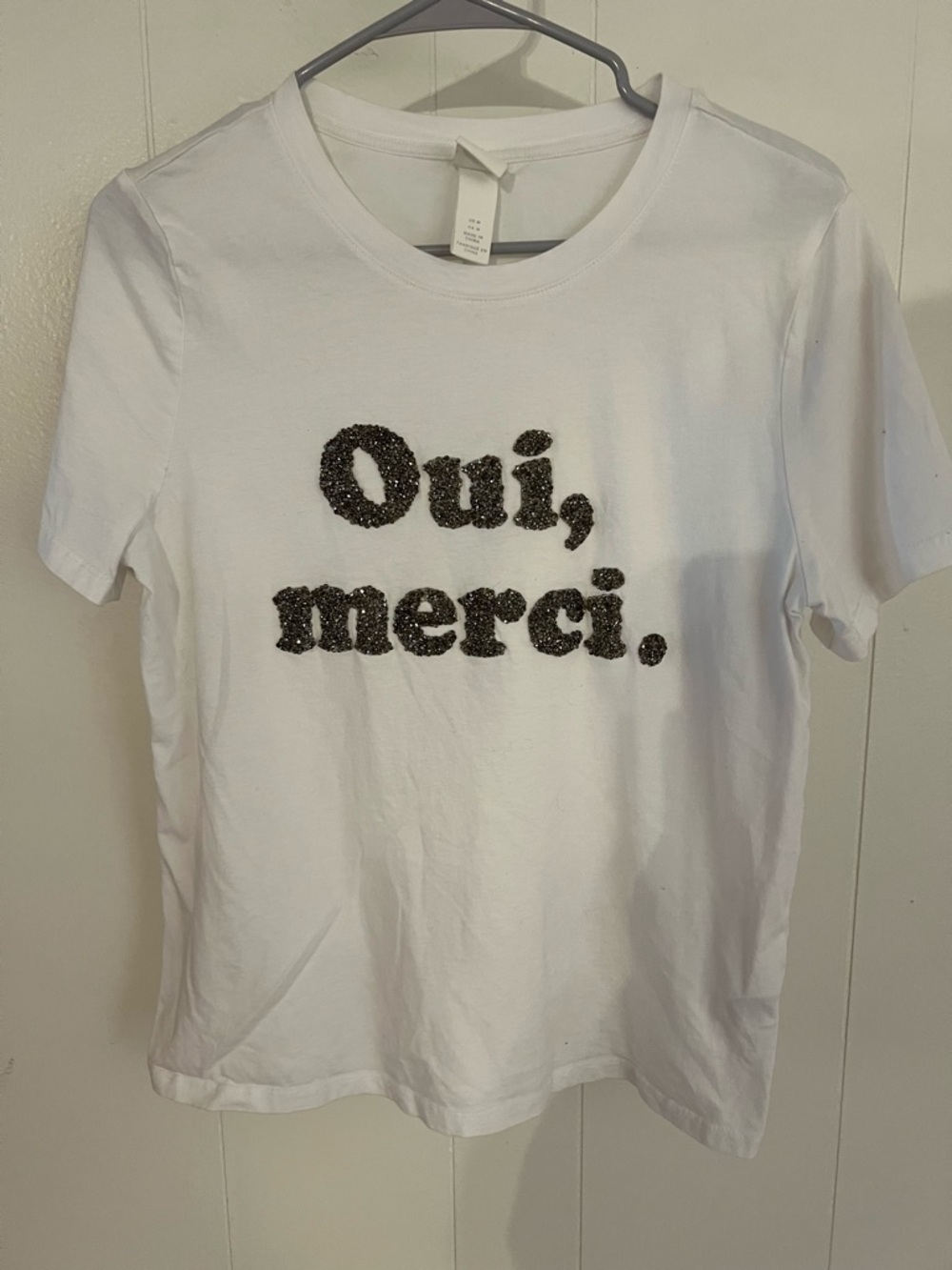 H&M White Tee with Black Sequin 'Oui, merci.' Script